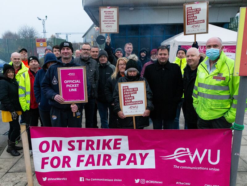 Royal Mail workers strike in Leeds. EPA