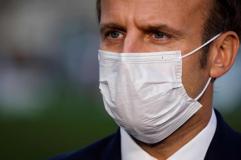 French President Emmanuel Macron speaks to the press after chairing a meeting with the medical staff of the Rene Dubos hospital center, in Pontoise, in the Val d'Oise, on October 23, 2020, as the country faces a new wave of infections to the Covid-19 (the novel coronavirus). / AFP / POOL / Ludovic MARIN
