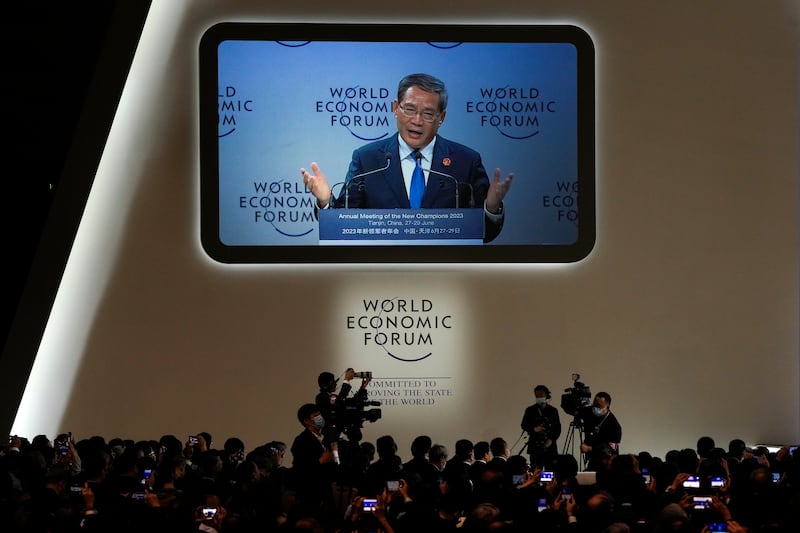 Chinese Prime Minister Li Qiang told the World Economic Forum's 'Summer Davos' in Tianjin that China will roll out more effective policies to expand domestic demand and open markets. AP