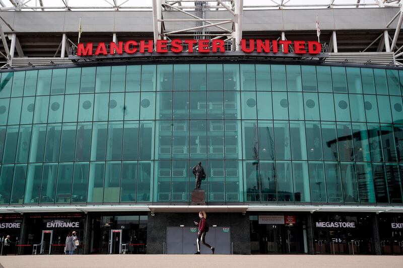 A view of locked gates at Old Trafford, home of Manchester United. Premier League clubs will gather via conference call on Thursday morning to discuss fixtures and finances amid the coronavirus pandemic. PA Photo. Picture date: Thursday March 19, 2020. See PA story SPORT Coronavirus. Photo credit should read: Martin Rickett/PA Wire