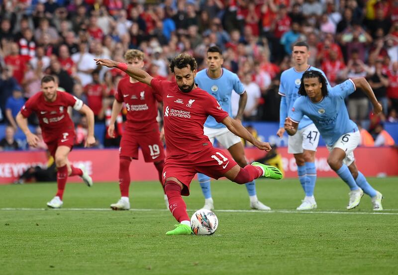 Mohamed Salah scores from the penalty spot. Getty