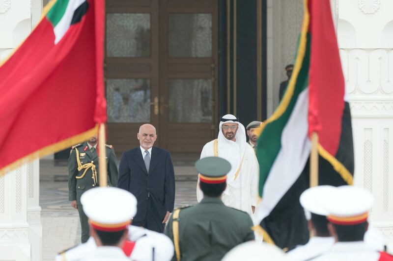 ABU DHABI, UNITED ARAB EMIRATES - March 17, 2019: HH Sheikh Mohamed bin Zayed Al Nahyan, Crown Prince of Abu Dhabi and Deputy Supreme Commander of the UAE Armed Forces (R), receives HE Ashraf Ghani, President of Afghanistan (L), at the Presidential Palace.  

( Rashed Al Mansoori / Ministry of Presidential Affairs )
---