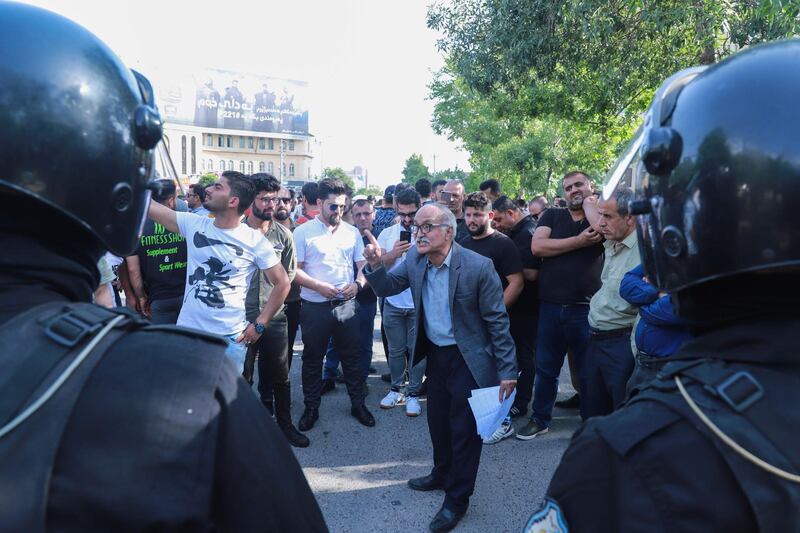 Iraqi Kurds gather during a demonstration demanding the end of coronavirus lockdown in the city of Sulaimaniyah, in the Kurdish autonomous region of northern Iraq.  AFP