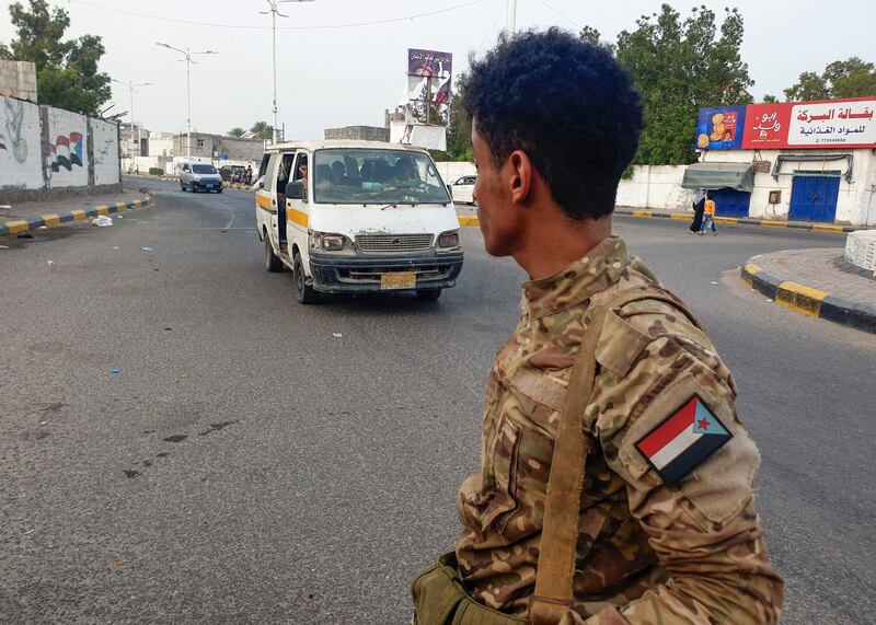 Fighters affiliated with Yemen's Southern Transitional Council at the site of an explosion in the Khormaksar area of Yemen's southern city of Aden. The current ceasefire has largely held but is due to expire on August 2. AFP