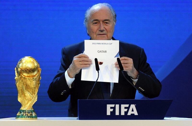 Sepp Blatter reveals Qatar's selection as the 2022 World Cup host nation in 2010. AP