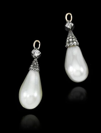 This undated handout photo released by Sotheby's Geneva shows a pair of natural pearl drop earrings that once belonged to Marie Antoinette, expected to sell for $30,000-50,000. One of the most famous royal jewellery collections ever to come to auction will be coming to Sothebyâ€™s in Geneva on 12 Nov. 2018. Entitled â€œRoyal Jewels from the Bourbon-Parma Familyâ€, the auction will span centuries of European history, from the reign of Louis XVI to the fall of the Austro-Hungarian Empire, and will offer fascinating insights into the splendor of one of Europeâ€™s most important royal dynasties. (Sotheby's Geneva via AP)