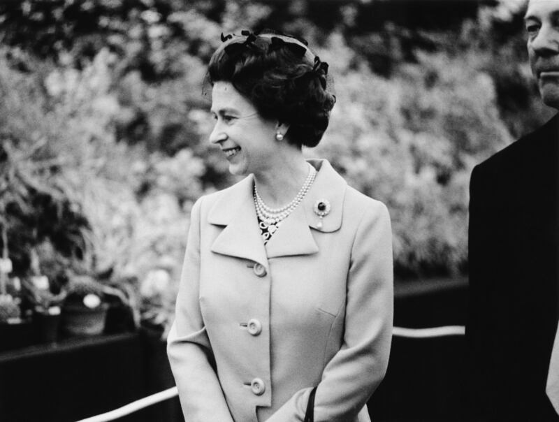 Queen Elizabeth views the garden displays in 1973. Getty Images