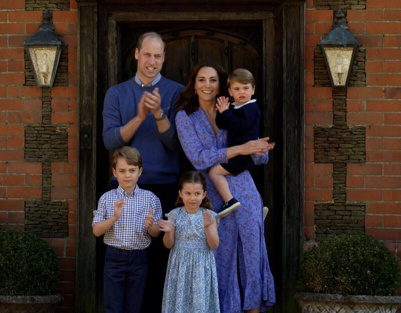 The Duke and Duchess of Cambridge clap for carers with their three children, George, Charlotte and Louis, in April 2020. Instagram / Kensington Royal 