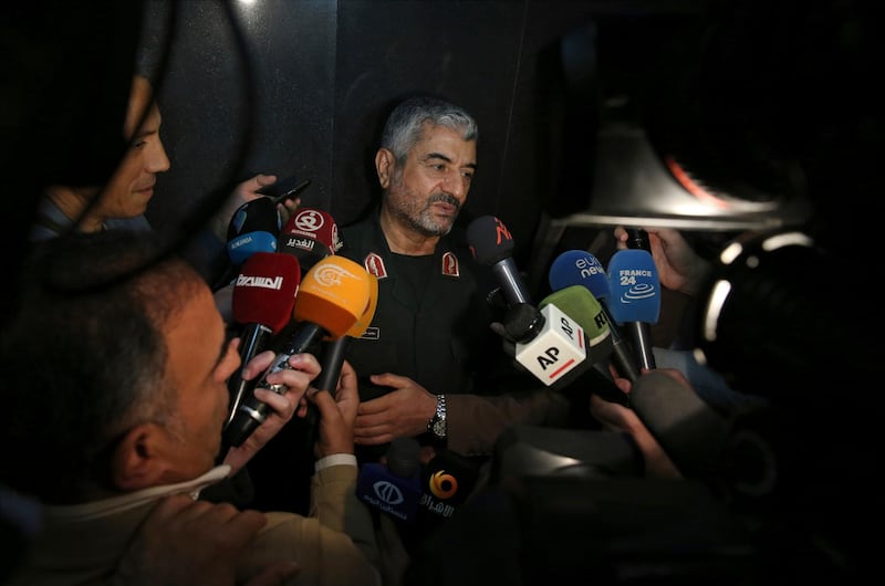 The head of Iran's paramilitary Revolutionary Guard Gen. Mohammad Ali Jafari speaks with journalists after his speech at a conference called "A World Without Terror," in Tehran, Iran, Tuesday, Oct. 31, 2017. Jafari said Tuesday that the country's supreme leader has limited the range of ballistic missiles it makes to 2,000 kilometers, or 1,240 miles. (AP Photo/Vahid Salemi)