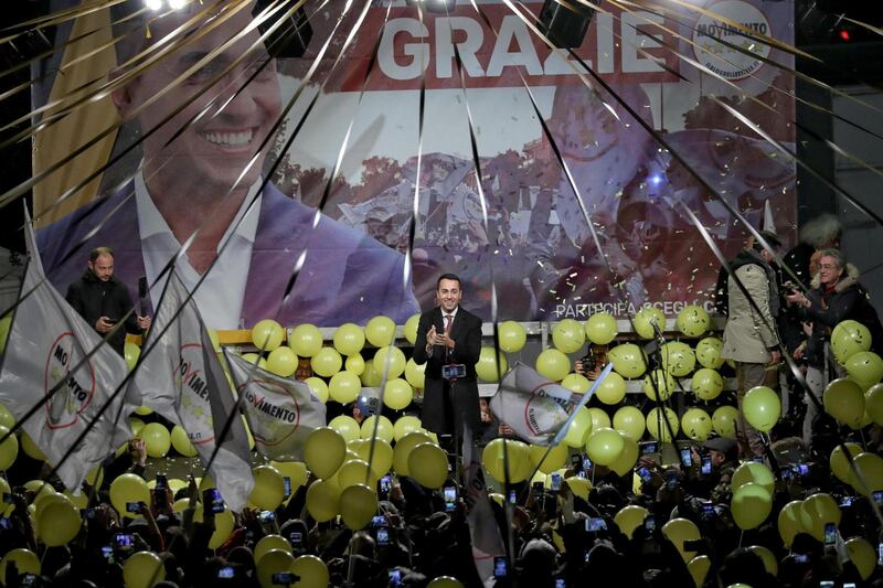 epa06585821 Italian 5-Star Movement's leader and candidate for the post of Italian Prime Minister, Luigi Di Maio celebrates with his supporters from the podio  in Pomigliano D'Arco, Italy, 06 March 2018. Vincenzo Boccia, the president of Italian industrial employers' confederation Confindustria, said that he was not spooked by the fact that the anti-establishment 5-Star Movement (M5S) was the group to win most votes in Sunday's general election.  EPA/CIRO FUSCO