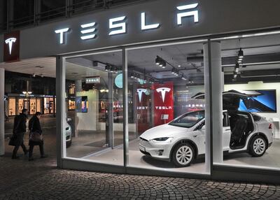 epa08981628 (FILE) - Pedestrians (L) pass US car manufacturer Tesla store displaying a Tesla X vehicle at Frankfurt's pedestrian area Fressgass, late 16 November 2017 in Frankfurt, Germany (reissued 02 February 2021). US authorities on 02 February 2021 posted a recall at a website of US government upon which Tesla will recall a total of more than 134,000 Model X and Model S vehicles equipped with touchscreen displays that in case of a failure could raise a crash risk.  EPA/MAURITZ ANTIN