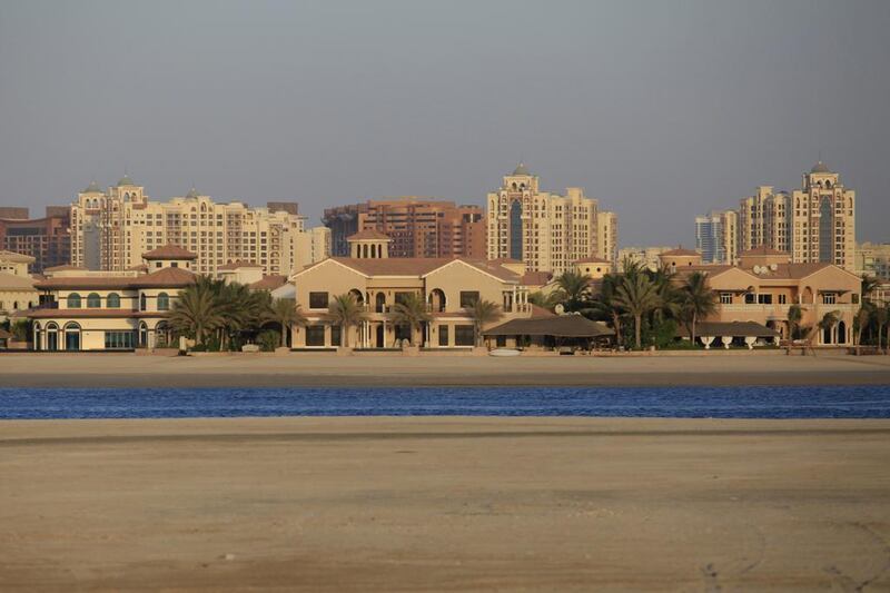 Villas along a frond on the Palm Jumeirah in Dubai. Average house prices fell during the first quarter of 2015. Sarah Dea / The National