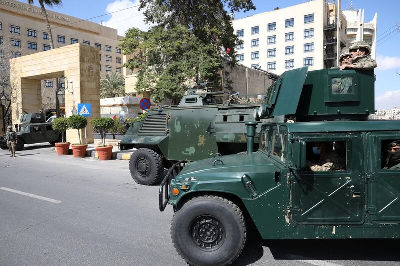 Jordanian soldiers stand guard outside a hotel that was transformed into a quarantine station amid concerns over the coronavirus in Amman, Jordan. Reuters