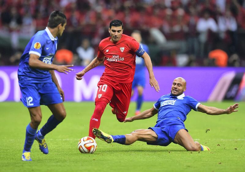WARSAW, POLAND - MAY 27:  Jose Antonio Reyes of Sevilla is tackled by Jaba Kankava of Dnipro during the UEFA Europa League Final match between FC Dnipro Dnipropetrovsk and FC Sevilla on May 27, 2015 in Warsaw, Poland.  (Photo by Shaun Botterill/Getty Images)