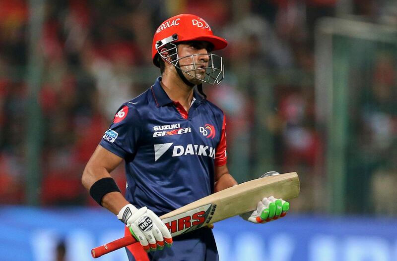 FILE- In this April 21, 2018 file photo, Delhi Daredevils' captain Gautam Gambhir leaves the field after losing his wicket during the VIVO IPL Twenty20 cricket match against Royal Challengers Bangalore in Bangalore, India. Gambhir has stepped down as captain of IPL franchise Delhi Daredevils after his team lost five of its first six matches. (AP Photo/Aijaz Rahi, File)