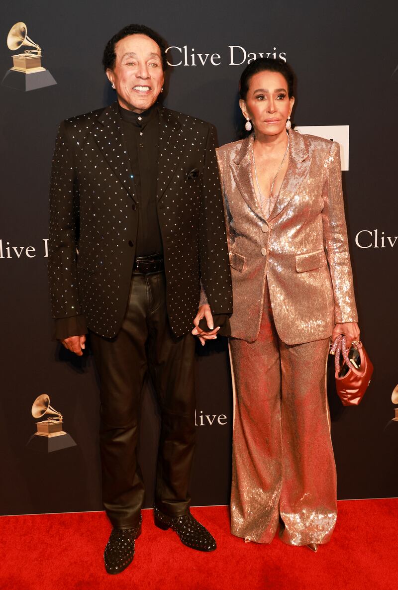 Singer Smokey Robinson and his spouse Frances Glandney attend. Reuters