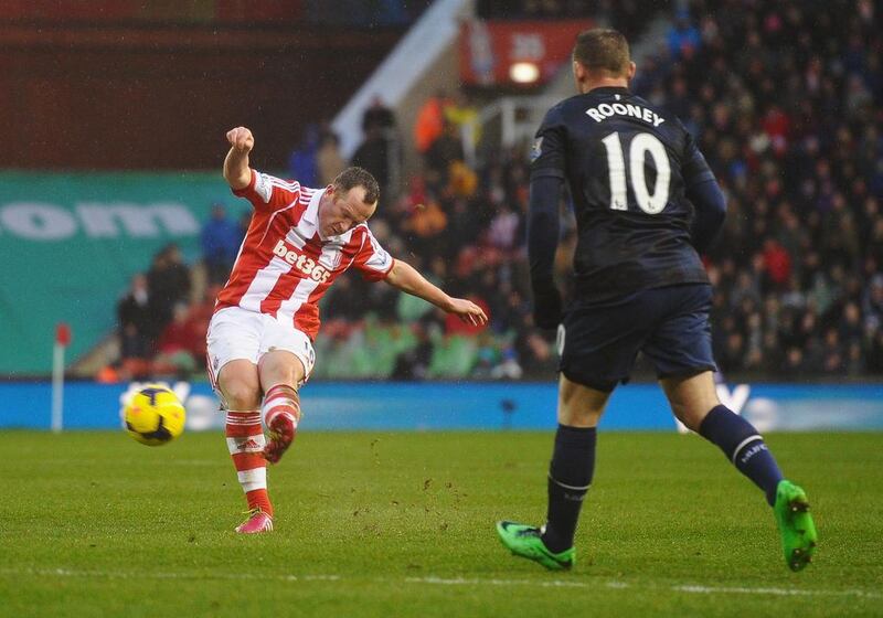 Charlie Adam, left, scores his second goal to lead Stoke City past Manchester United 2-1 on Saturday. Laurence Griffiths / Getty Images