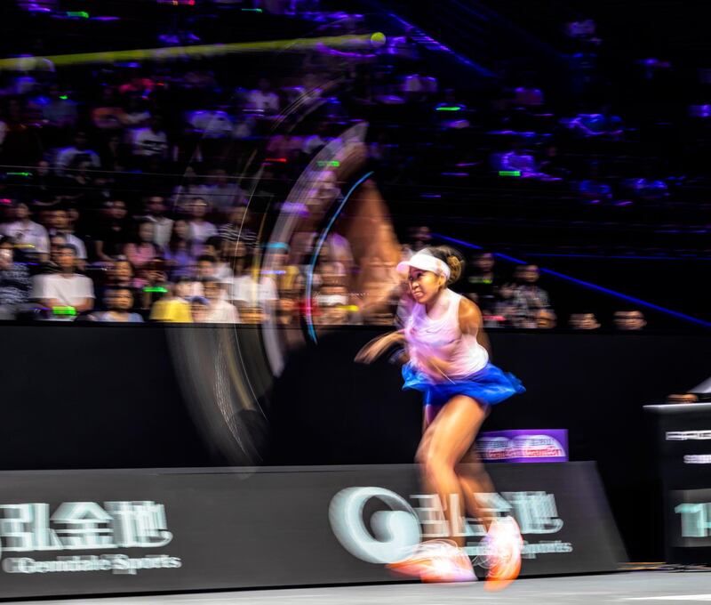 Naomi Osaka in action against Petra Kvitova during their group match at the WTA Finals tennis tournament in Shenzhen, China, on Sunday, 27 October. EPA
