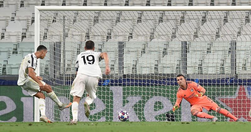 Cristiano Ronaldo (L) scores the 1-1 equaliser from the penalty spot. EPA