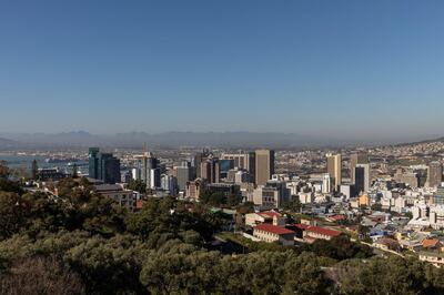 The port area stands beyond commercial high-rise properties in Cape Town, South Africa, on Thursday, July 23, 2020. South Africa’s surging coronavirus infections and the resumption of rolling blackouts are clouding the outlook for the economy. Photographer: Dwayne Senior/Bloomberg