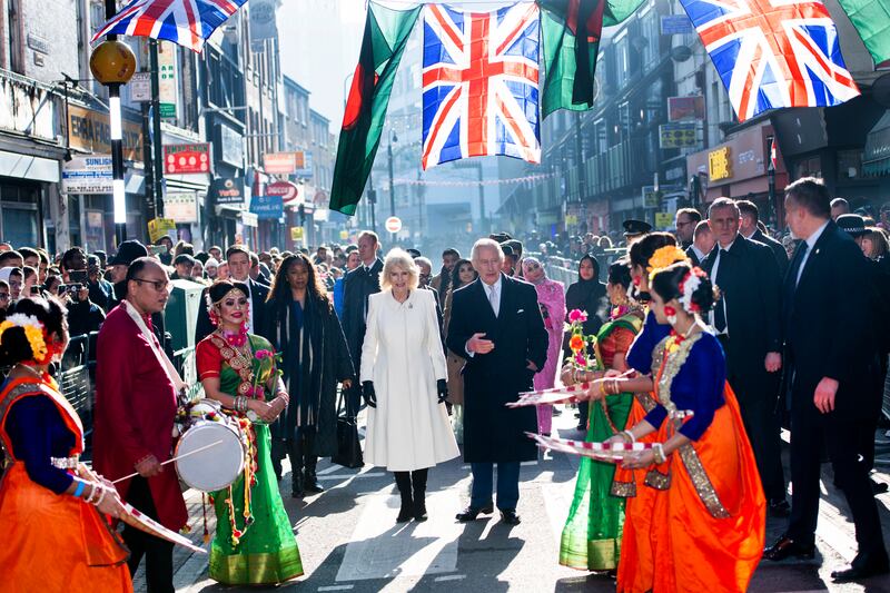 King Charles and Queen Camilla meet members of the public during a visit to the Bangladeshi community of Brick Lane in London in February 