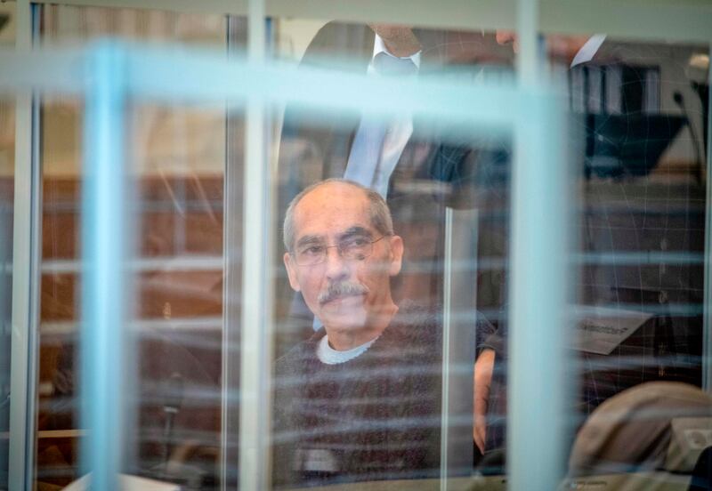 Syaian defendant Anwar Raslan, 57, arrives at court for an unprecedented trial on state-sponsored torture in Syria, on April 23, 2020 at court in Koblenz, western Germany.  Two alleged former Syrian intelligence officers go on trial in Germany on April 23, 2020 accused of crimes against humanity in the first court case worldwide over state-sponsored torture by Bashar al-Assad's regime.
Prime suspect Anwar Raslan, an alleged former colonel in Syrian state security, stands accused of carrying out crimes against humanity while in charge of the Al-Khatib detention centre in Damascus between April 29, 2011 and September 7, 2012.  / AFP / POOL / Thomas Lohnes
