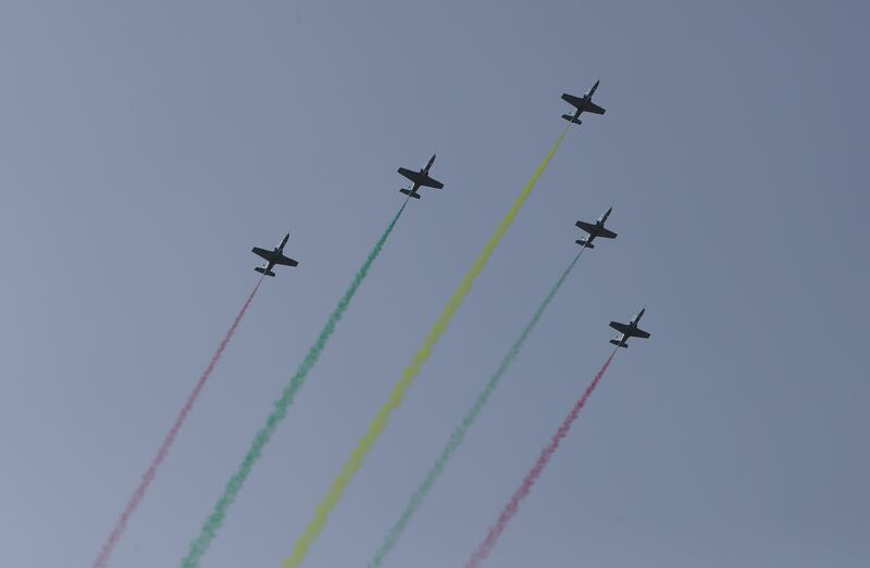 Myanmar fighter jets perform in the sky.  AP