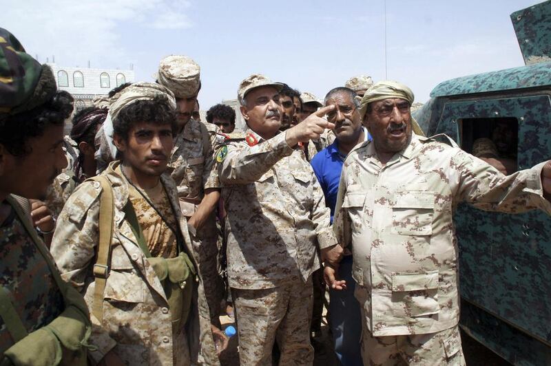 Yemen’s defence minister, Major General Mohammed Nasser Ahmed, second right, visits Shabwa province on May 4, 2014, as the army presses an offensive against Al Qaeda-linked militants. Yemen Defence Ministry via Reuters