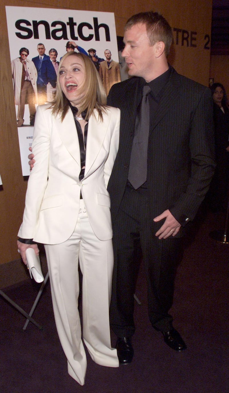 Guy Ritchie and his wife Madonna at the premiere of 'Snatch' at the Directors Guild, Los Angeles, Ca. 1/18/01. (Photo by Kevin Winter/Getty Images).