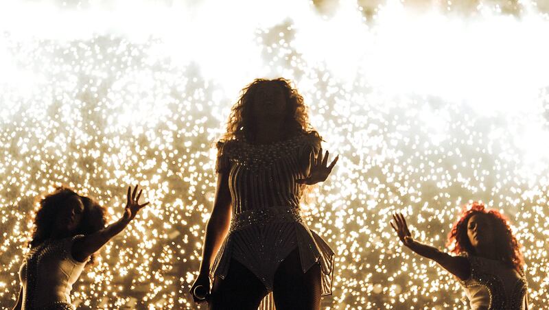 IMAGE DISTRIBUTED FOR PARKWOOD ENTERTAINMENT - Singer Beyonce performs on her "Mrs. Carter Show World Tour 2013", on Saturday, July 13, 2013 at the Bridgestone Arena in Nashville, Tenn.(Photo by Robin Harper/Invision for Parkwood Entertainment/AP Images) *** Local Caption ***  Beyonce - Mrs Carter World Tour - Nashville.JPEG-00d67.jpg