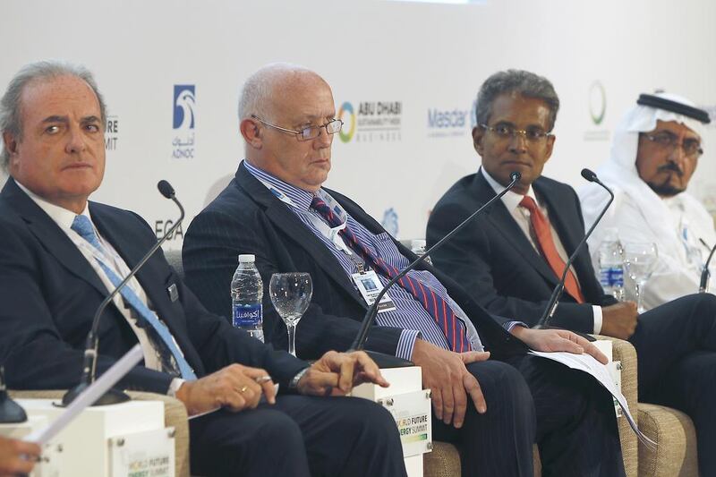 From right: Abdullah Al Shehri, the Governor of the Saudi electricity and cogeneration regulatory authority; Paddy Padmanathan, the chief executive of <a href="http://www.thenational.ae/business/energy/acwa-plans-low-cost-solar-project-in-jordan">Acwa Power</a>; Duncan Allison, the managing director and regional head of power and renewables at HSBC; and Roberto de Diego Arozamena, the chief executive of Abdul Latif Jameel Energy and Environmental Services, at a panel discussion on Financing Saudi Arabia’s Renewable Energy Strategy. Ravindranath K / The National