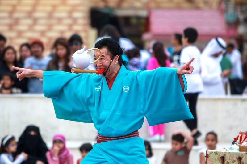 Senmaru of Japan does his tea cup balancing act trick. Victor Besa for The National