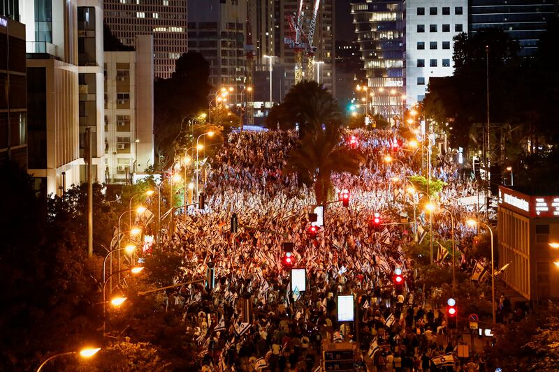 Protesters at a mass 'Independence party' demonstration against Israeli Prime Minister Benjamin Netanyahu and his government's judicial reforms, in Tel Aviv on April 25. Reuters