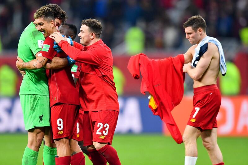 Liverpool players enjoy winning the Club World Cup semi final. EPA