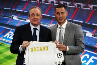 Soccer Football - Real Madrid Unveil Eden Hazard - Santiago Bernabeu, Madrid, Spain - June 13, 2019   Real Madrid president Florentino Perez and Real Madrid's Eden Hazard during the presentation    REUTERS/Sergio Perez