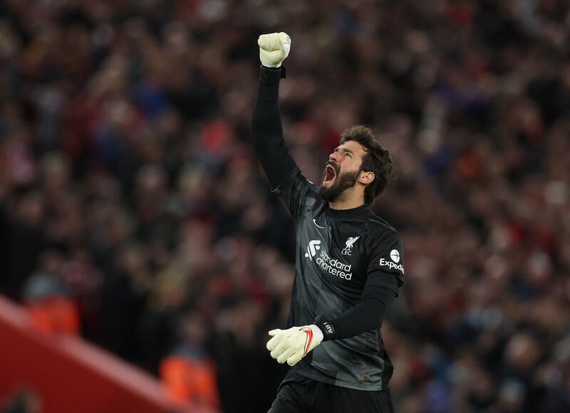 Liverpool's Alisson celebrates after Mohamed Salah scored their second goal. Reuters