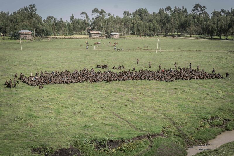 Ethiopian soldiers sit down for a break during a training session. AFP