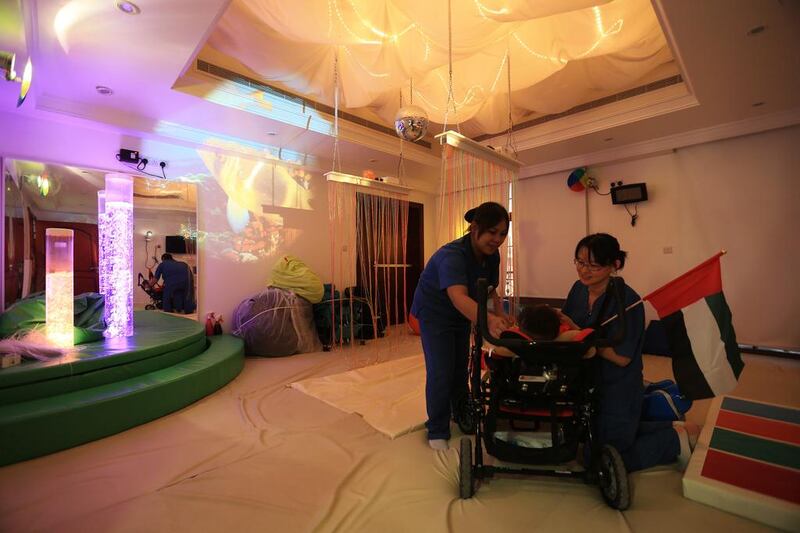 Nurses and care givers look after 75 in-patients at the ProVita rehab centre at Khalifa City in Abu Dhabi. Above, a patient in the facility’s sensory room. Ravindranath K / The National