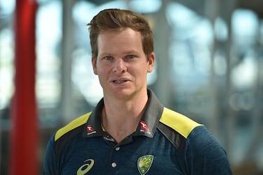 Australian cricketer Steve Smith talks to the media at Sydney airport. AFP