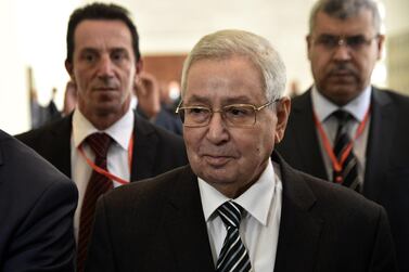 Abdelkader Bensalah speaker of the upper house of parliament, arrives to attend a meeting at the Palais des Nations in the Algerian capital. AFP