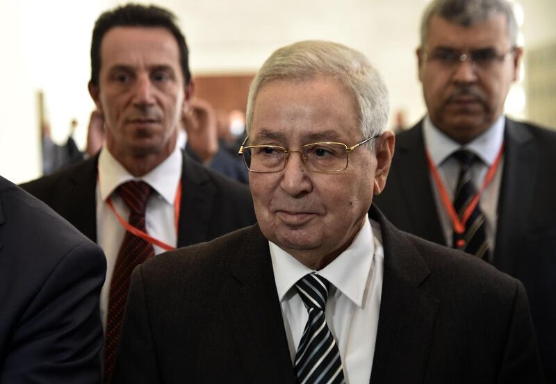 Abdelkader Bensalah (C) speaker of the upper house of parliament, arrives to attend a meeting at the Palais des Nations in the Algerian capital Algiers on April 9, 2019.  Algerian lawmakers are set to confirm an interim replacement for Abdelaziz Bouteflika today after the ailing president resigned last week in the face of massive protests.
The constitution stipulates that the,currently 77-year-old Bensalah, take the presidential reins for the next 90 days. / AFP / RYAD KRAMDI                        
