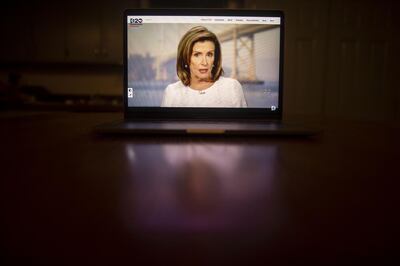 U.S. House Speaker Nancy Pelosi, a Democrat from California, speaks during the virtual Democratic National Convention seen on a laptop computer in Tiskilwa, Illinois, U.S., on Wednesday, Aug. 19, 2020. The DNC, which began Monday and ends Thursday with Joe Biden accepting the nomination for president, will be almost entirely virtual with speakers delivering addresses from around the U.S. that will be streamed on the internet. Photographer: Daniel Acker/Bloomberg