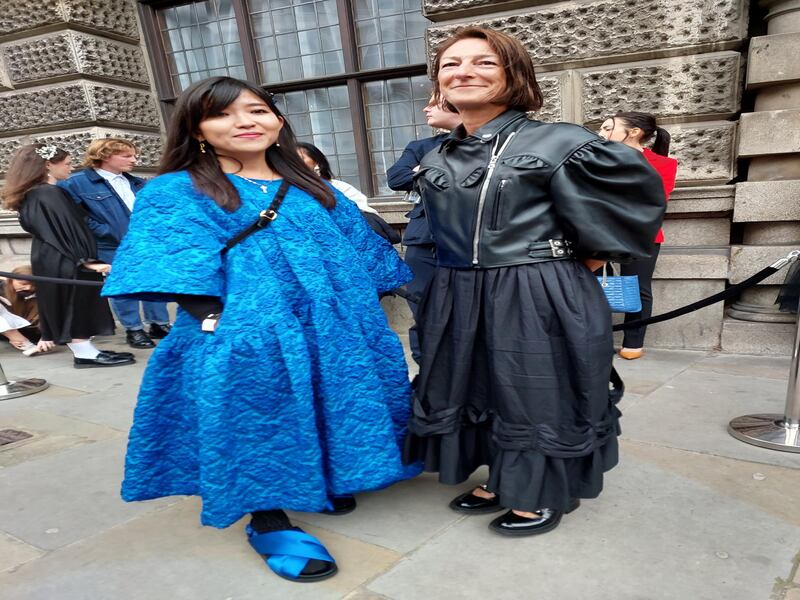 A woman wears blue Molly Goddard at her show at the Old Bailey in London.