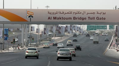 DUBAI, UNITED ARAB EMIRATES- Sep 9: Traffic flow was normal in the morning at  Al Maktoum bridge toll gate in Dubai. ( Pawan Singh / The National ) *** Local Caption ***  PS007- TRAFFIC.jpgPS007- TRAFFIC.jpg