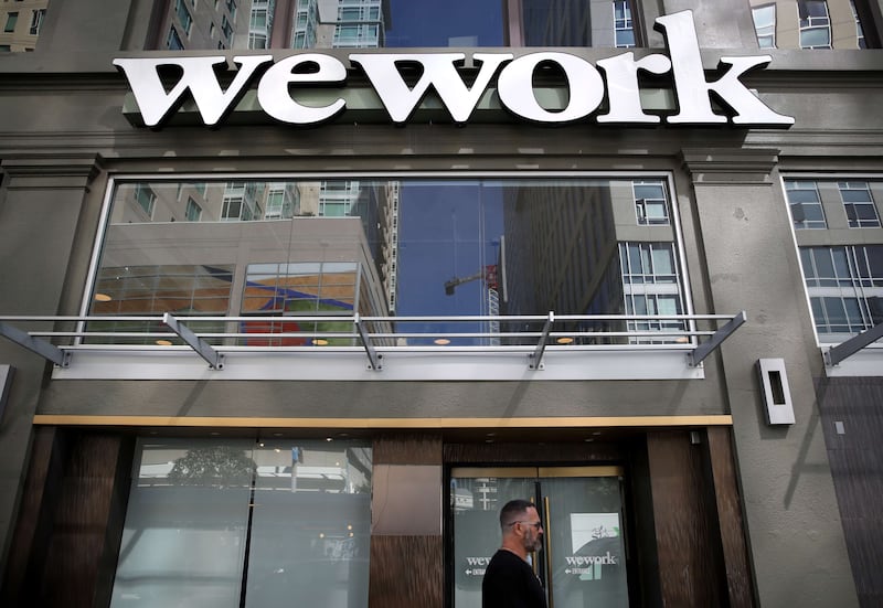 SAN FRANCISCO, CALIFORNIA - OCTOBER 07: A sign is posted on the exterior of a WeWork office on October 07, 2019 in San Francisco, California. Days after withdrawing its registration for an initial public offering, WeWork also warned employees that the company could be set to lay off nearly 2,000 people, about 16 percent of its workforce.   Justin Sullivan/Getty Images/AFP
== FOR NEWSPAPERS, INTERNET, TELCOS & TELEVISION USE ONLY ==
