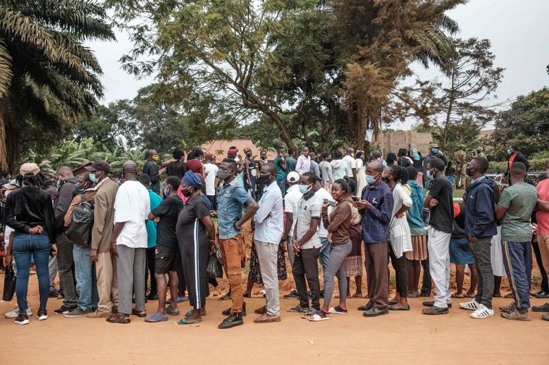 Voters queue to vote at a polling station in Magere, Uganda. AFP