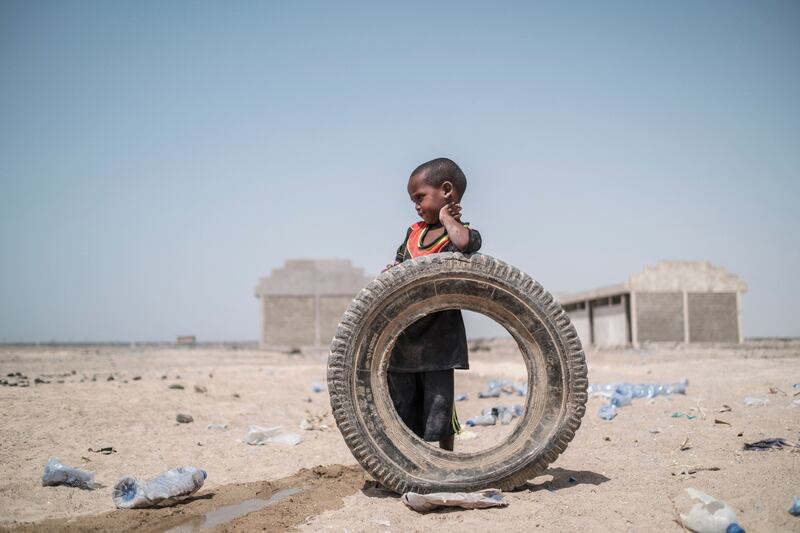 An internally displaced child at a school in Ethiopia. More than 15 months since the first shots rang out, foreign envoys are talking up paths to peace for Ethiopia while Prime Minister Abiy Ahmed publicly refers to the conflict in the past tense. AFP