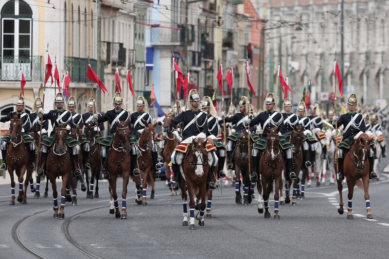 Members of the Portuguese National Republican Guard in Lisbon during a welcome ceremony as part of the Pope's five-day visit to attend the World Youth Day gathering of young Catholics. AFP