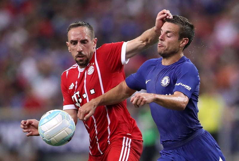 Bayern Munich’s Franck Ribery in action withChelsea's Cesar Azpilicueta. Yong Tech Lim / Reuters