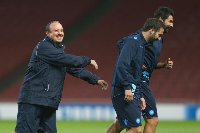 Napoli manager Rafa Benitez, left, is starting to find success in his second stint in Italy. Paul Gilham / Getty Images


